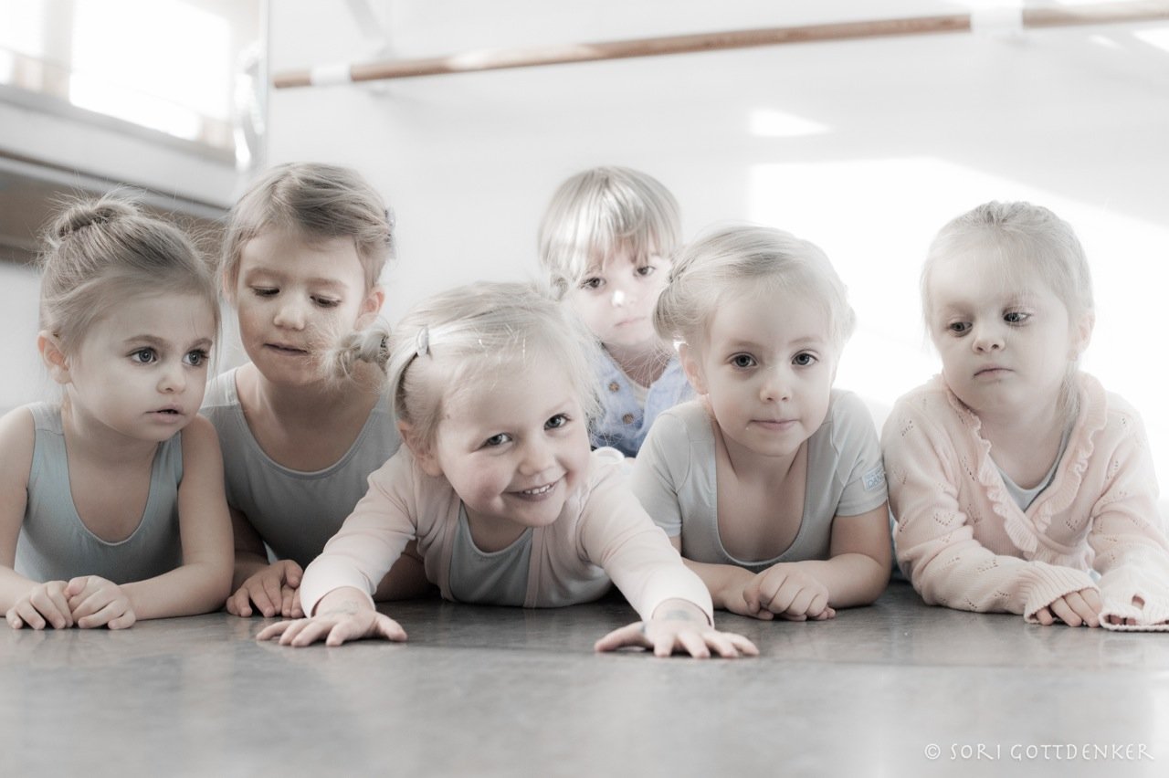 Photo by in house photographer Sori Gottdenker of 3-4 year old students hanging out in the dance studio after Pre Ballet class